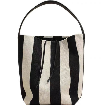 black and white contrast color wide shoulder striped canvas bag
