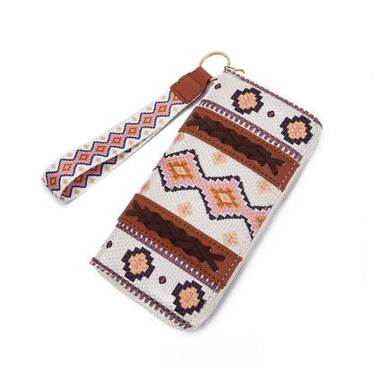 vintage cotton and linen printed bohemian style lady hand carrying wallet card holder