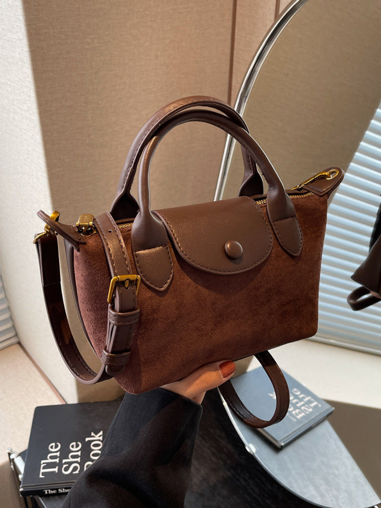 hand held dumplings matte stitching shoulder crossbody