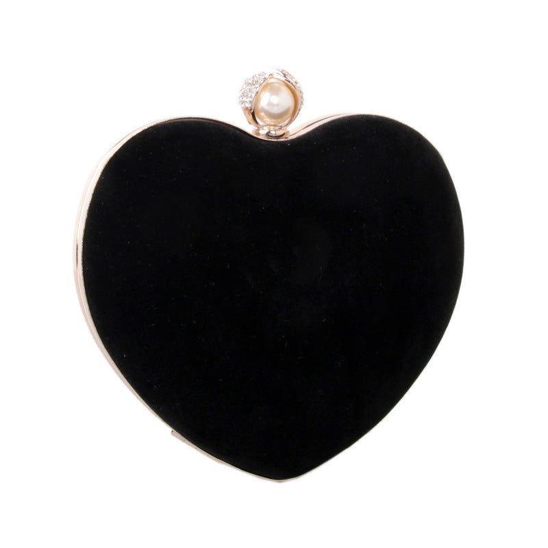 heart shaped dinner bag with diamond pearls