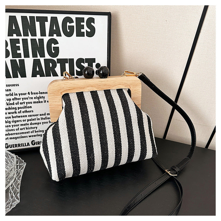 new striped canvas wooden clip mouth clutch