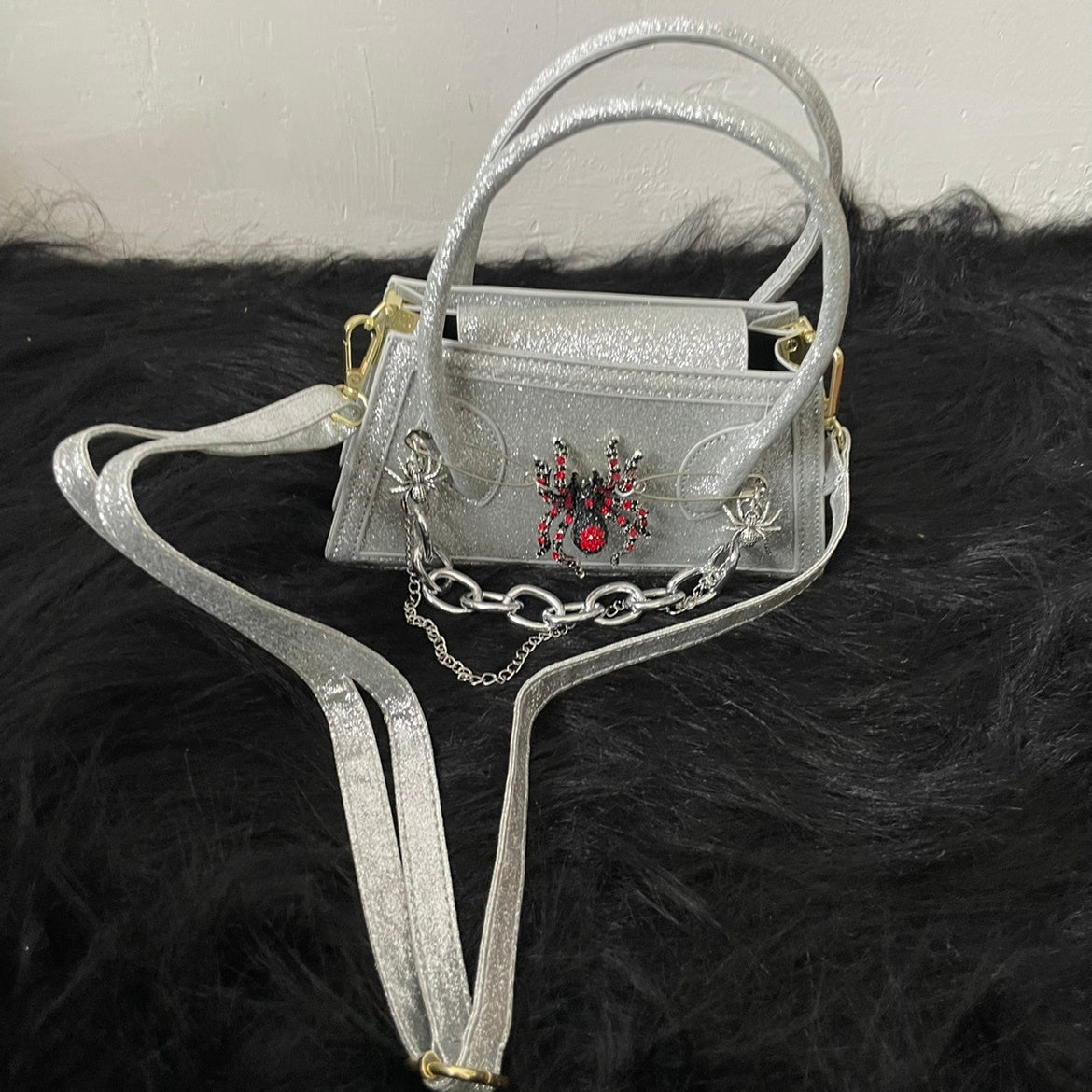 snakeskin spider dark mini crossbody handbag