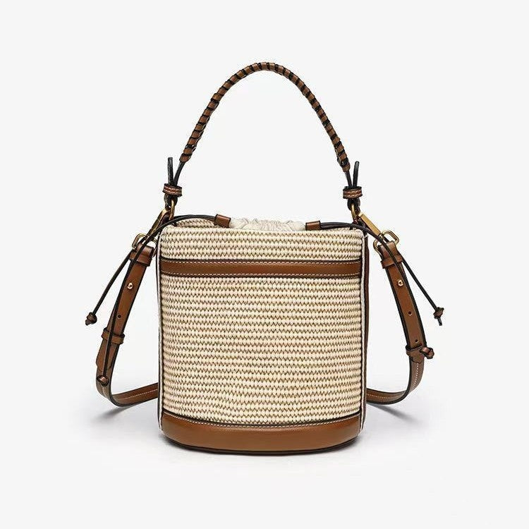 Brown Cylindrical Tote Bag With Dual Handles, Designed For Handheld Or Crossbody Wear