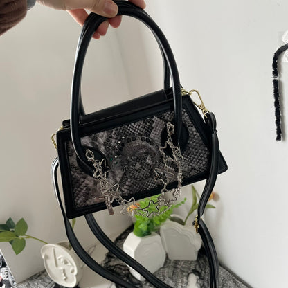 snakeskin spider dark mini crossbody handbag