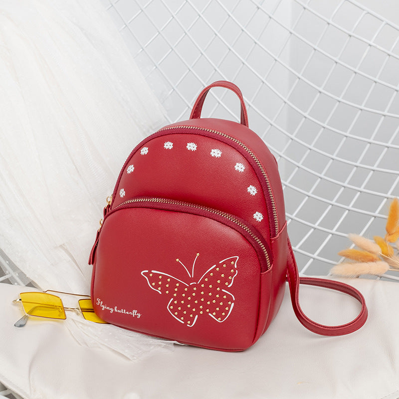 printed mobile phone bag rivet butterfly backpack