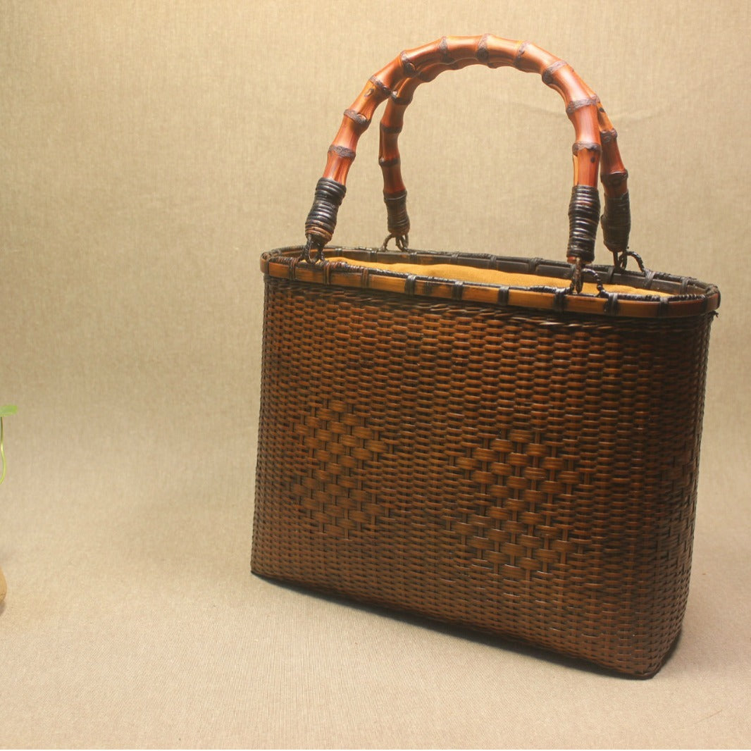 womens hand carrying beach weaving handbag