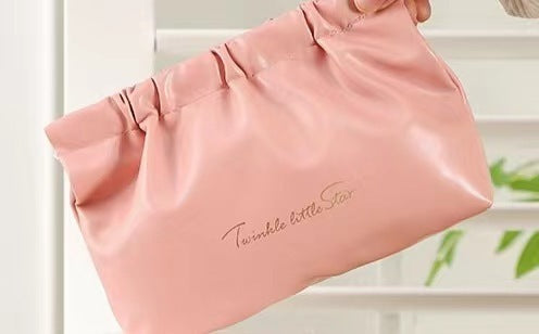 good looking hand held portable cosmetic bag