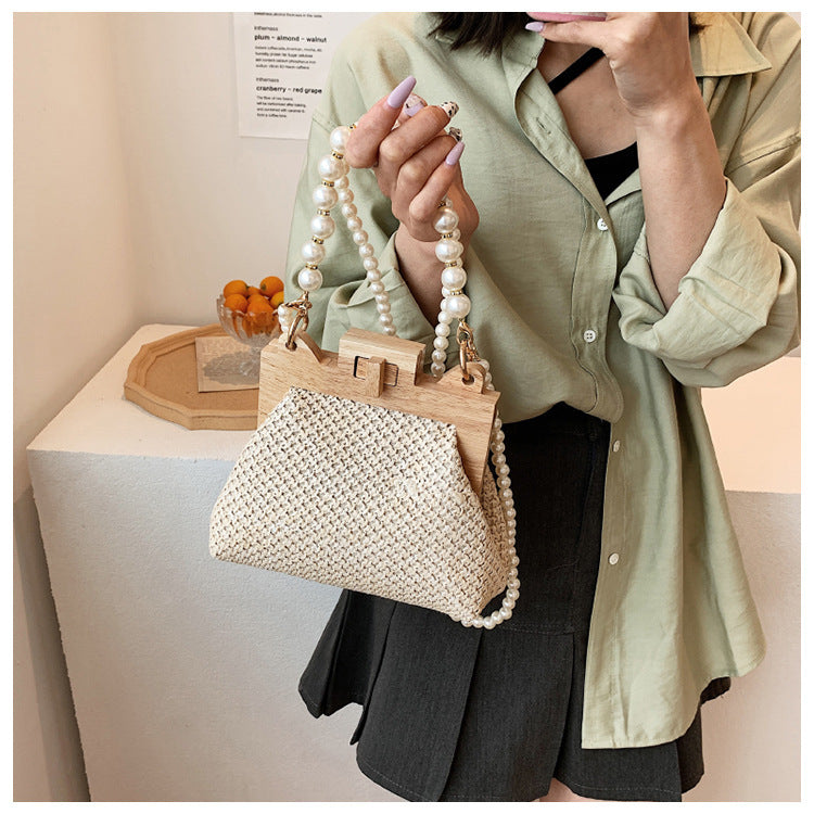 womens straw beach pearl chain woven shoulder bag